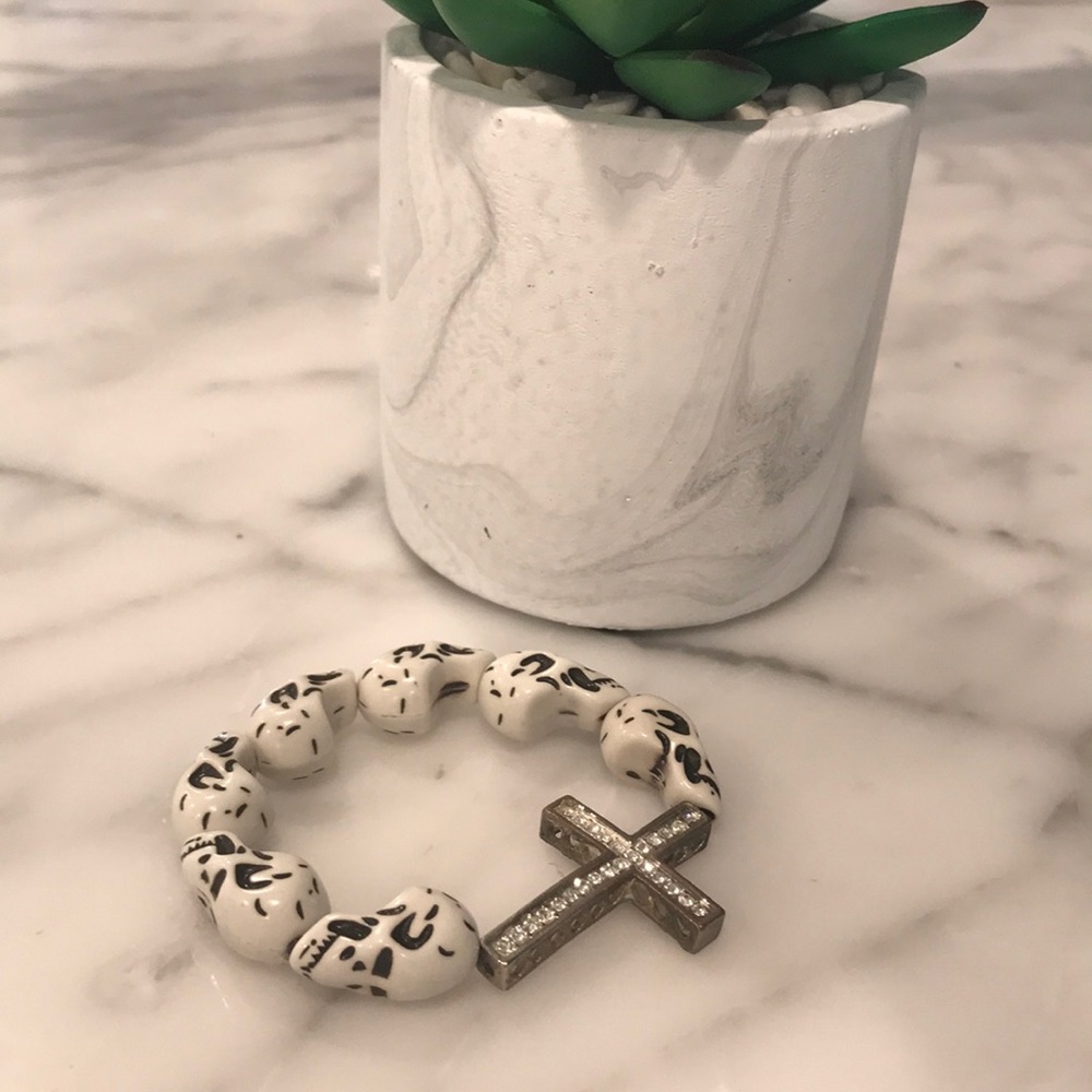 Skull and rhinestone cross bracelet.